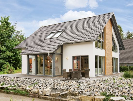 Façade en plâtre d'une maison à ossature Façade en plâtre d'une maison à ossature