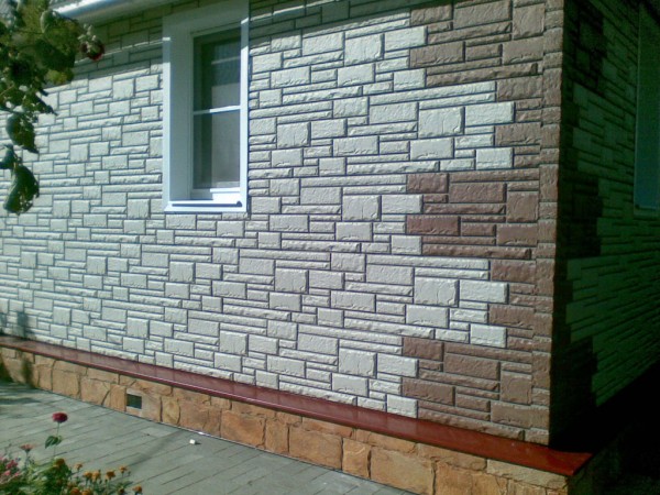 Photo d'une maison en vinyle lambrissé Photo d'une maison en vinyle lambrissé