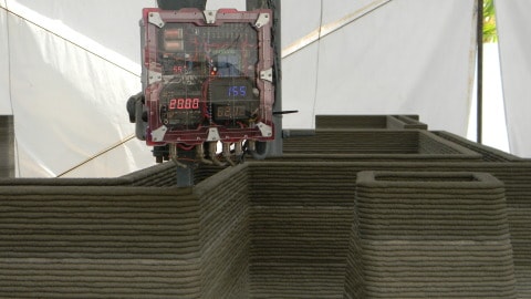 Machine d'impression de structures en béton: stratification de mortier